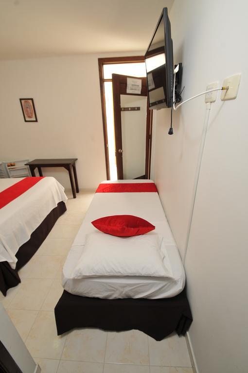 Hotel San Julian Buga Pokoj fotografie