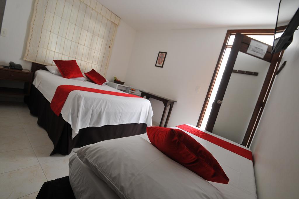 Hotel San Julian Buga Pokoj fotografie